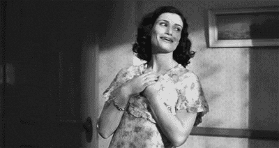 An animated GIF of a woman swooning.
