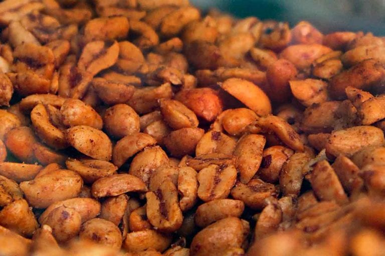 A bowl of dry-roasted chile peanuts.