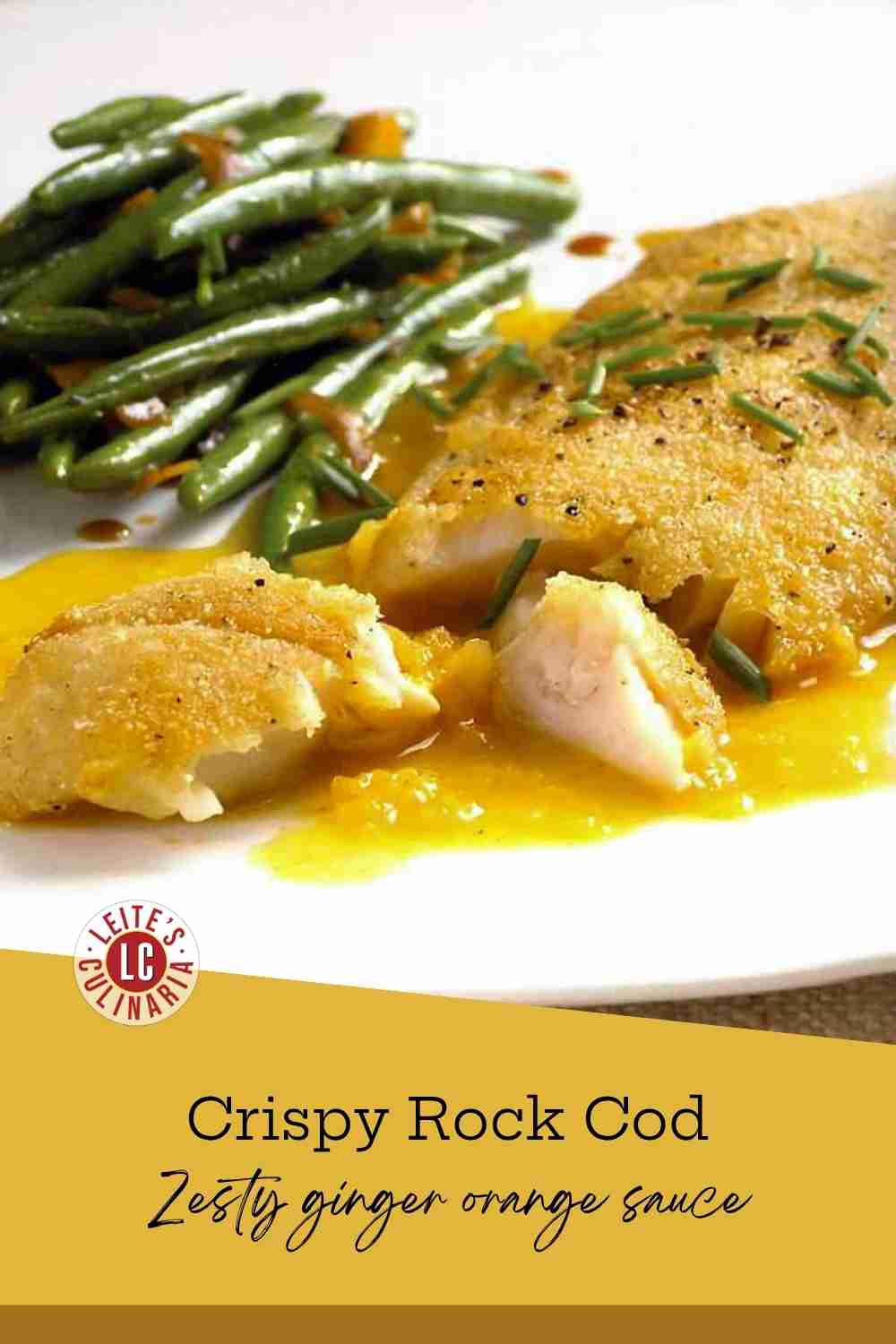 Pan-seared crispy fish fillet served over a bright yellow ginger-citrus sauce with fresh green beans.