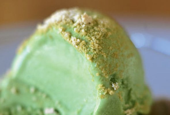 A scoop of green tea ice cream.