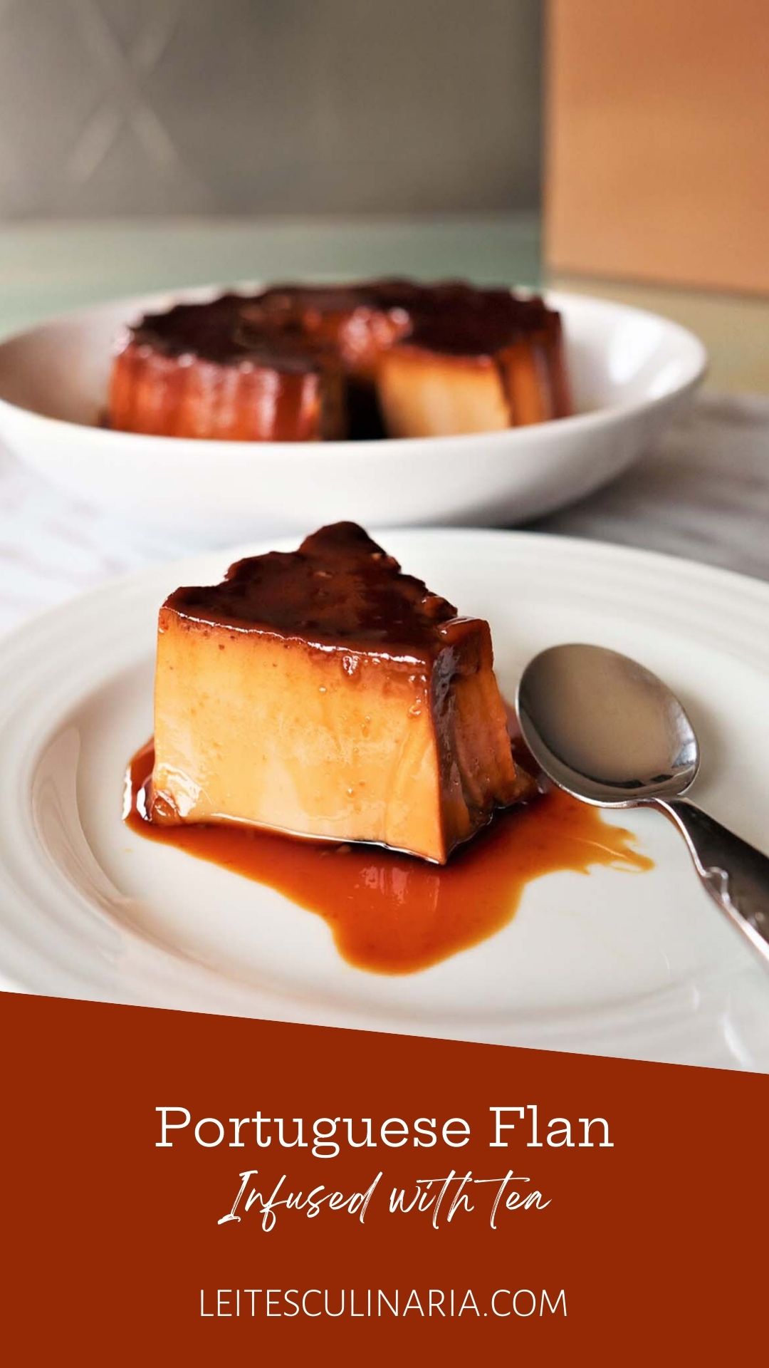 A piece of Portuguese tea flan on a white plate, drizzled with caramel sauce.