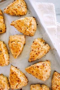 A tray of bacon, egg, and Cheddar scones
