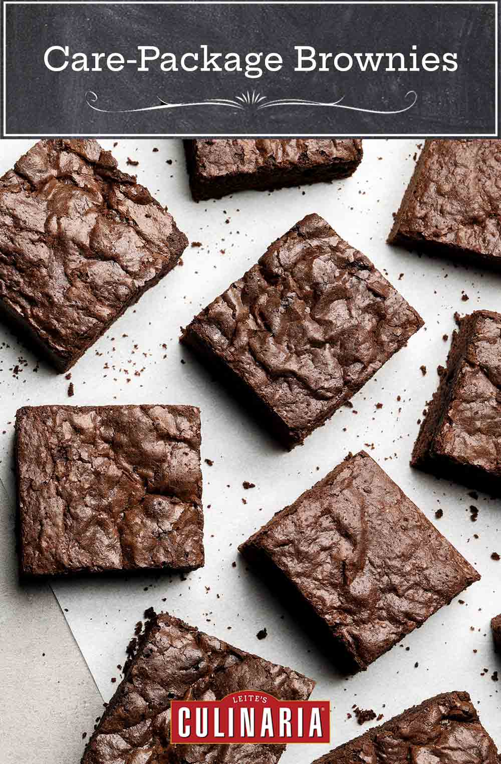 Squares of care-package brownies on parchment paper.