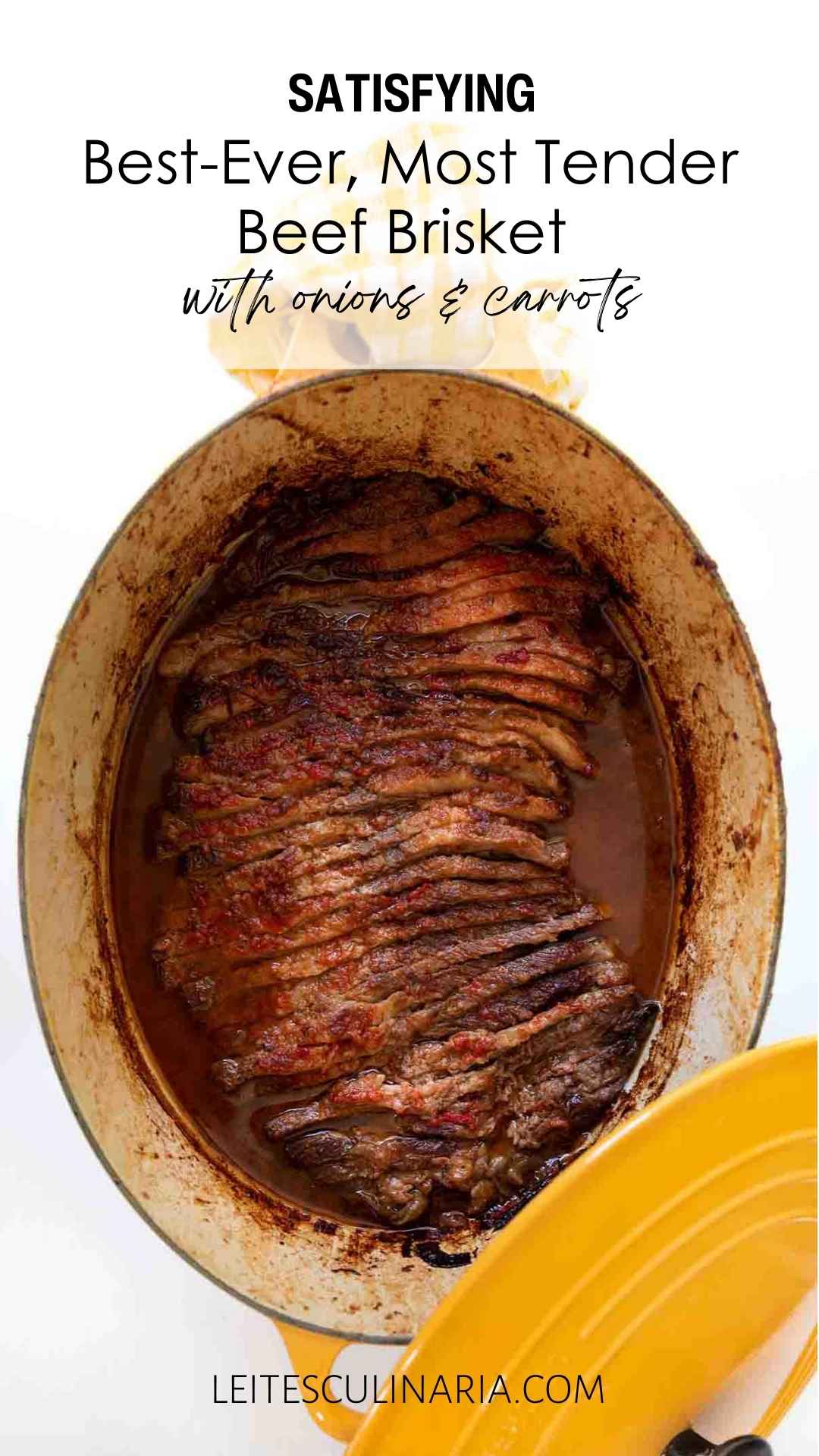 A yellow Le Creuset pot with Nach Waxman's sliced beef brisket inside.