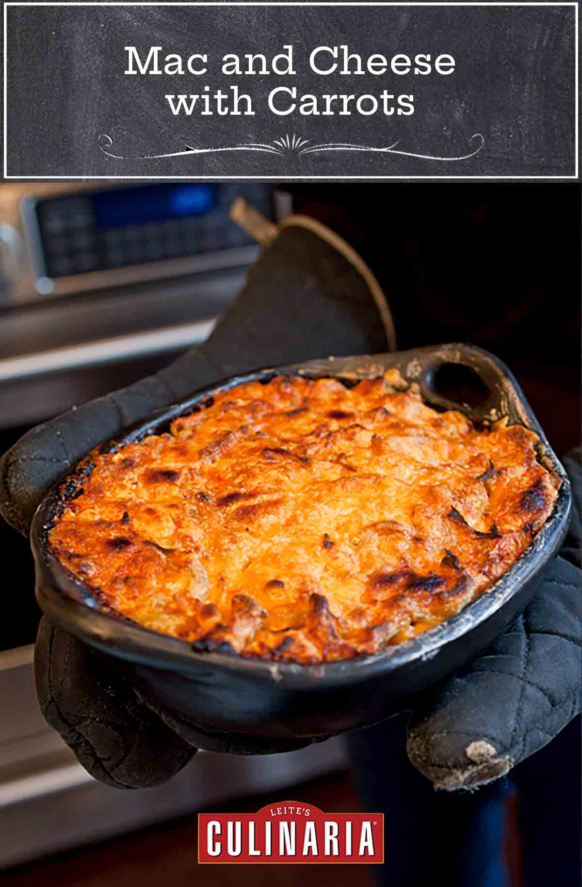 A casserole dish of baked mac and cheese with carrots.