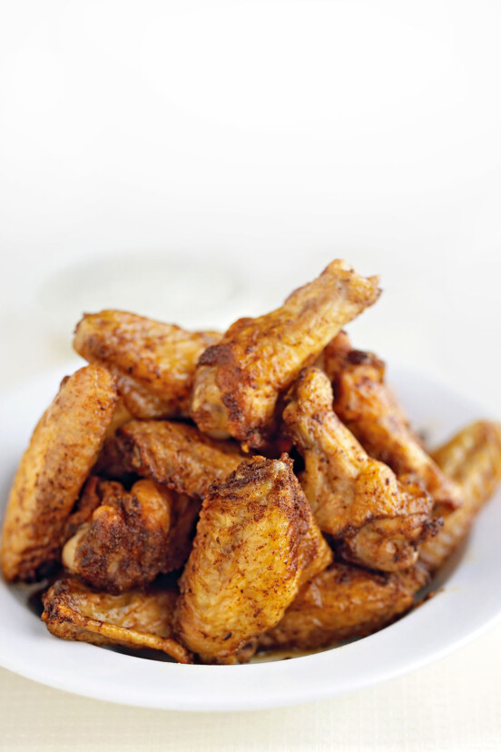 A bowl of five spice chicken wings.
