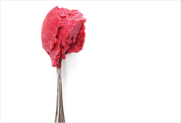 Fruit and sour beer sorbet on a spoon