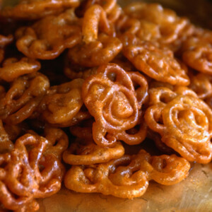 Indian Fried Dough Jalebi stacked on a table.