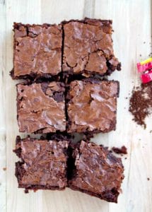 Six one-bowl mocha brownies on wood