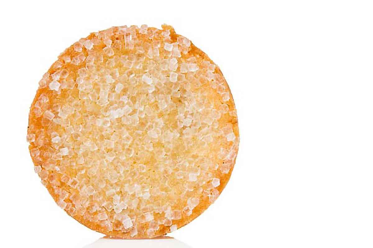 One French sable cookies on a white background