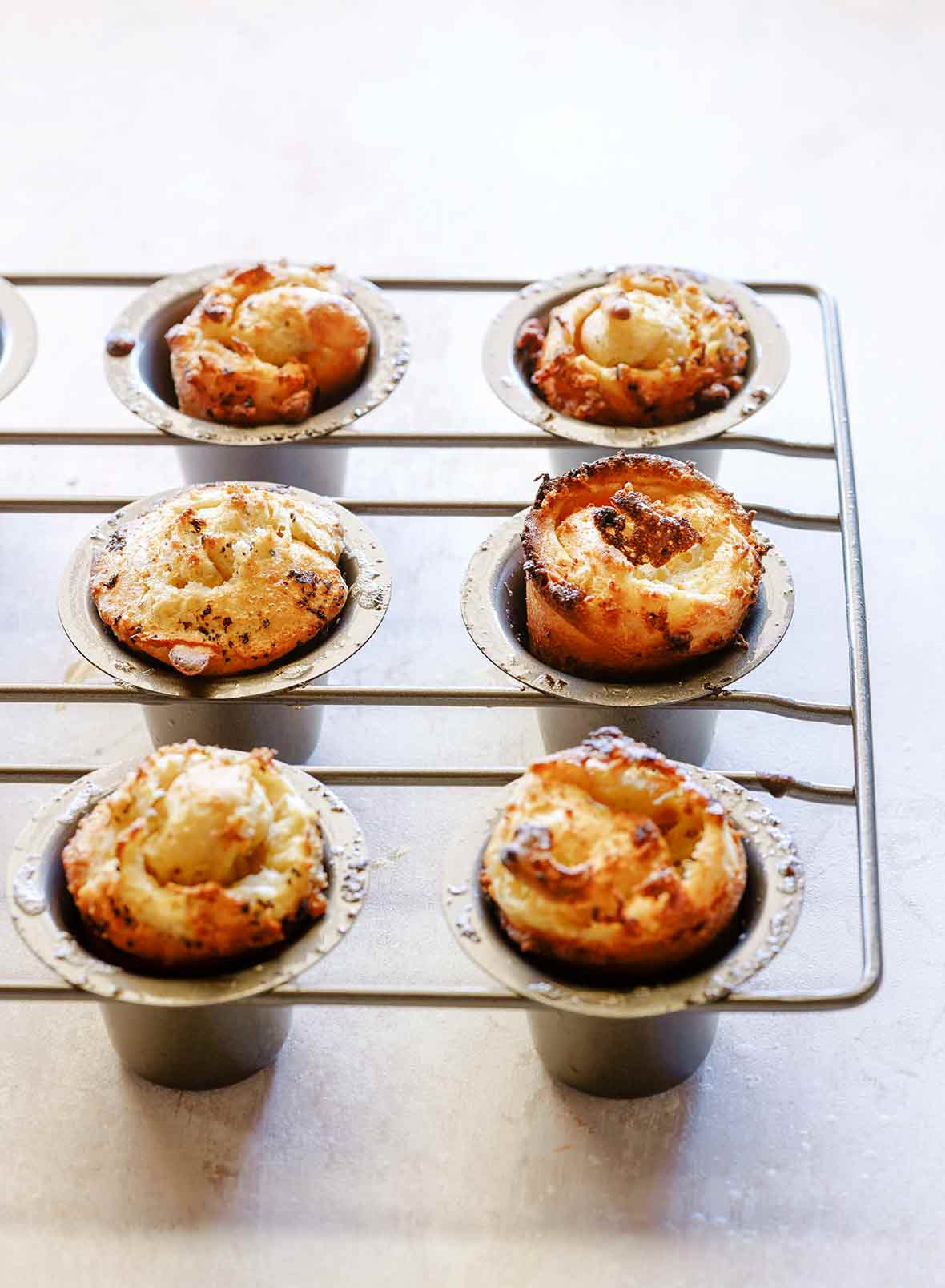 A rack of six golden brown and puffy Yorkshire pudding