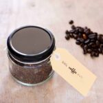 A jar of coffee rub with a manila gift tag.