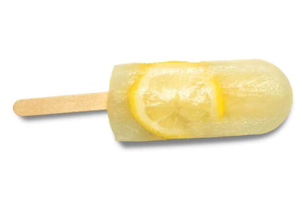 A yellow popsicle with a slice of lemon inside on a stick.