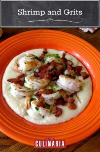 A Fiesta bowl filled with cheesy shrimp and grits with bacon