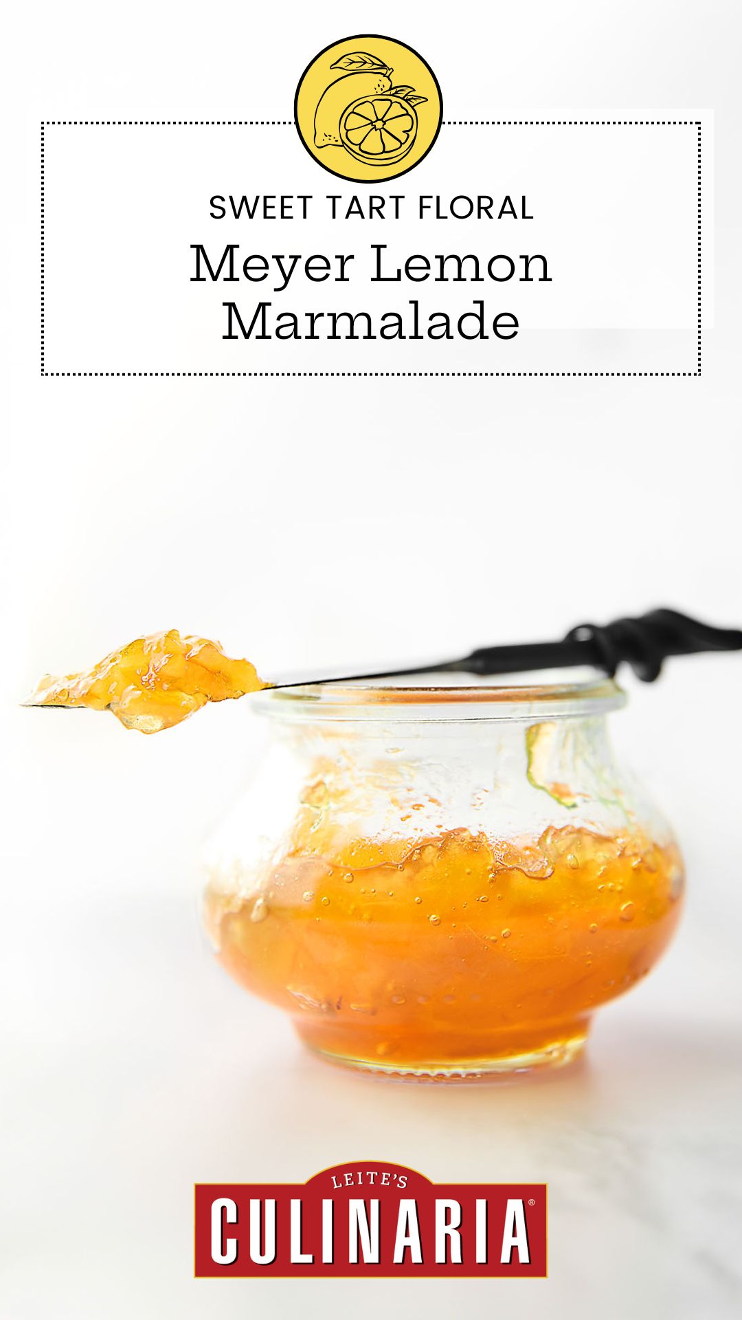 A small jam jar filled with Meyer lemon marmalade. Resting on top is a knife with a dollop of marmalade on top.