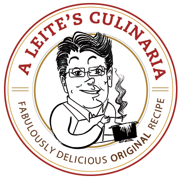 A caricature of David Leite, with the words, "A Leite's Culinaria, fabulously delicious original recipe" encircling it.