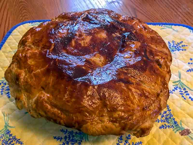 A beef and Guinness pot pie with a puff pastry crust