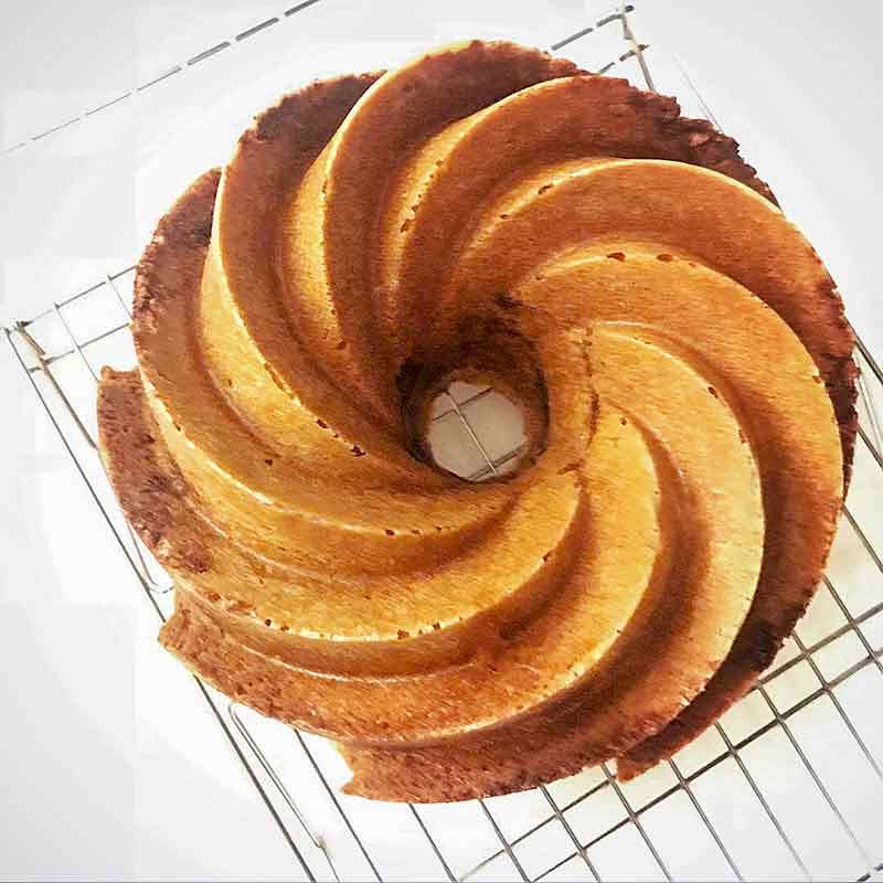 Overhead photo of a swirl Zingerman's Cake with cinnamon and walnuts