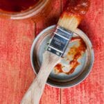 A basting brush with chipotle maple barbecue sauce