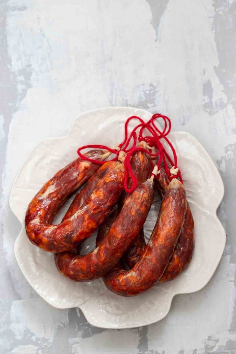 Four links of chouriço pork sausage