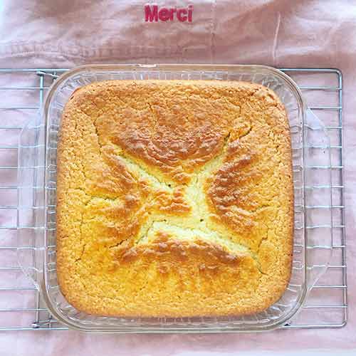 Square pan with warm buttermilk cornbread inside