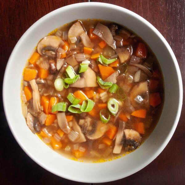 A bowl of mushroom barley soup.