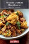A bowl of roasted curried cauliflower mixed with onions and topped with cilantro
