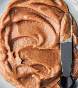 Swirls of vegan caramel with a knife on the side