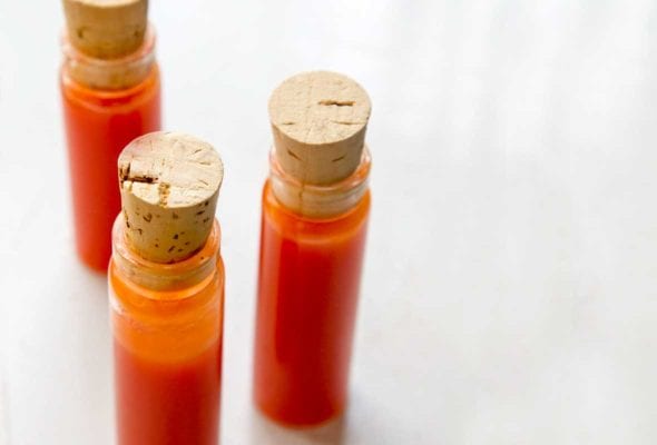 Three corked vials of homemade hot sauce