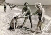 Three Russian women on a beach.