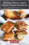 Four pieces of Cheddar, bacon, apple grilled cheese sandwiches stacked on top of each other.