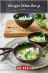 Two bowls of ginger miso soup with tofu, turnip greens, and miso broth