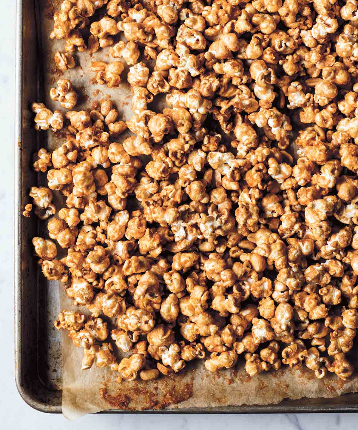 A baking sheet filled with maple caramel corn.
