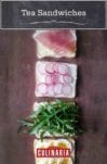 Tea sandwiches being assembled with four slices of bread topped with sliced egg, arugula, radish, and prosciutto.