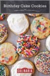 8 birthday cake cookies covered in white frosting and colored sprinkles