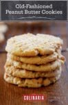 A stack of five old-fashioned peanut butter cookies, with crosshatch marks on top