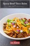 Spicy beef taco bake with ground beef, beans tortilla chips, chopped onions, and lettuce in a white bowl.