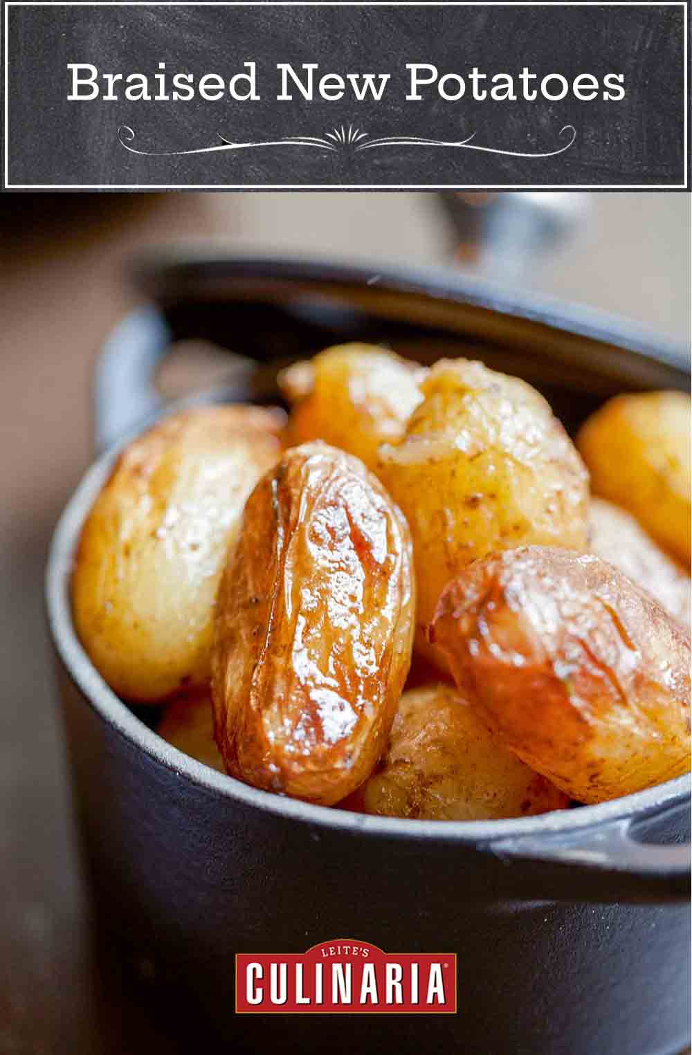 Cast iron pot with braised new potatoes inside