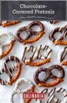 An assortment of chocolate covered pretzels with white and dark chocolate coating and sprinkles