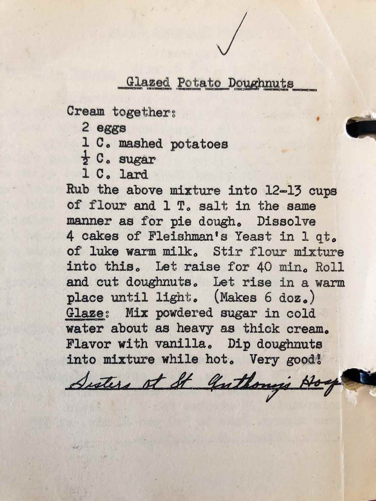 An old typewritten recipe for glazed potato doughnuts as part of the writing, "Comfort Me With Dougnuts".