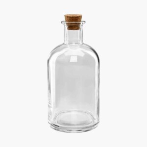 A round clear glass bottle with a small cork in it.