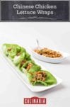 A rectangular plate with six Chinese chicken lettuce wraps and a bowl of extra filling beside it.