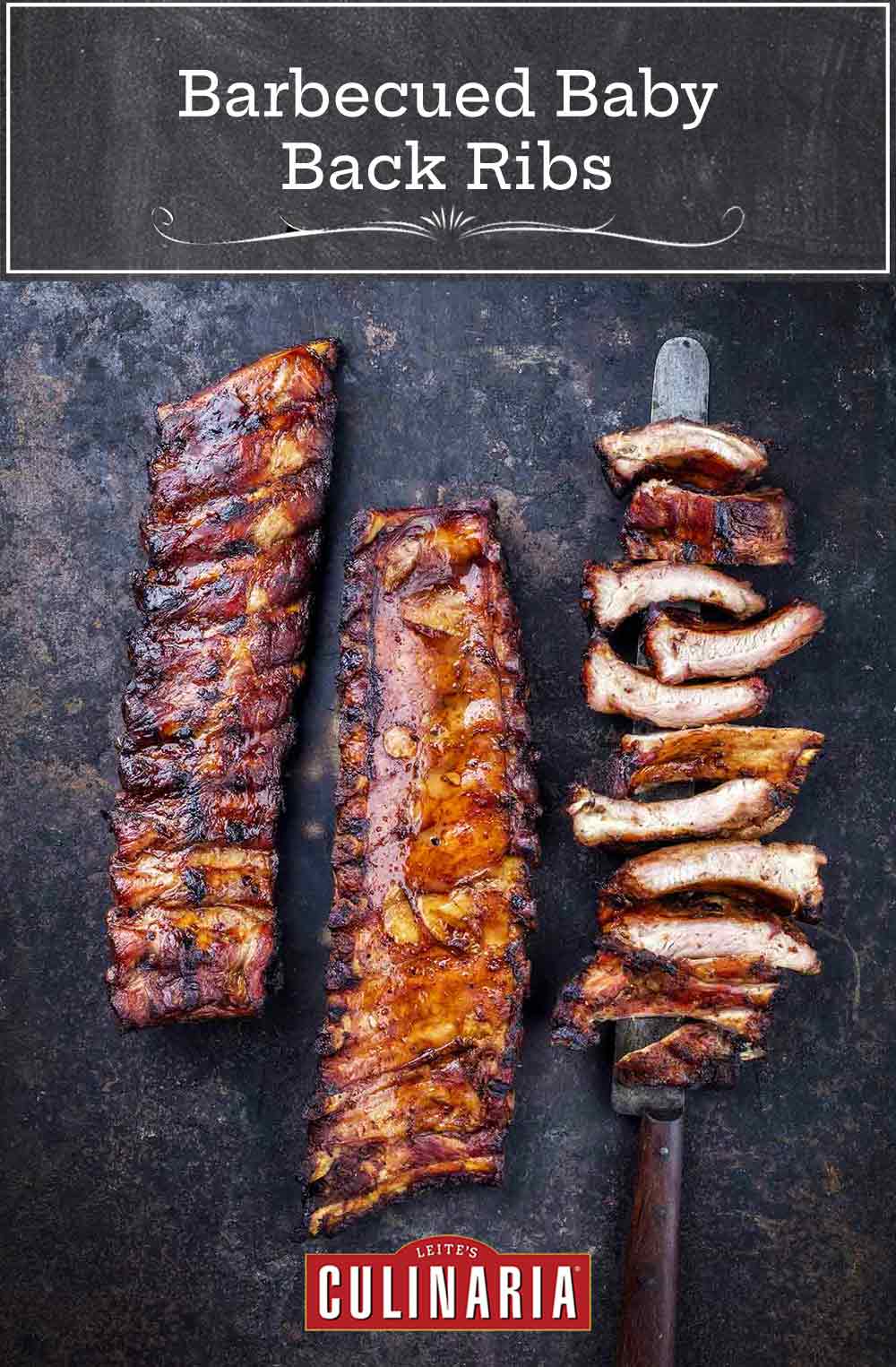 Two racks of barbecued baby back ribs, and a third rack cut into individual ribs, resting on a knife.
