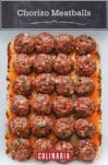 White pan of 24 orange-red chorizo golf-ball-size meatballs