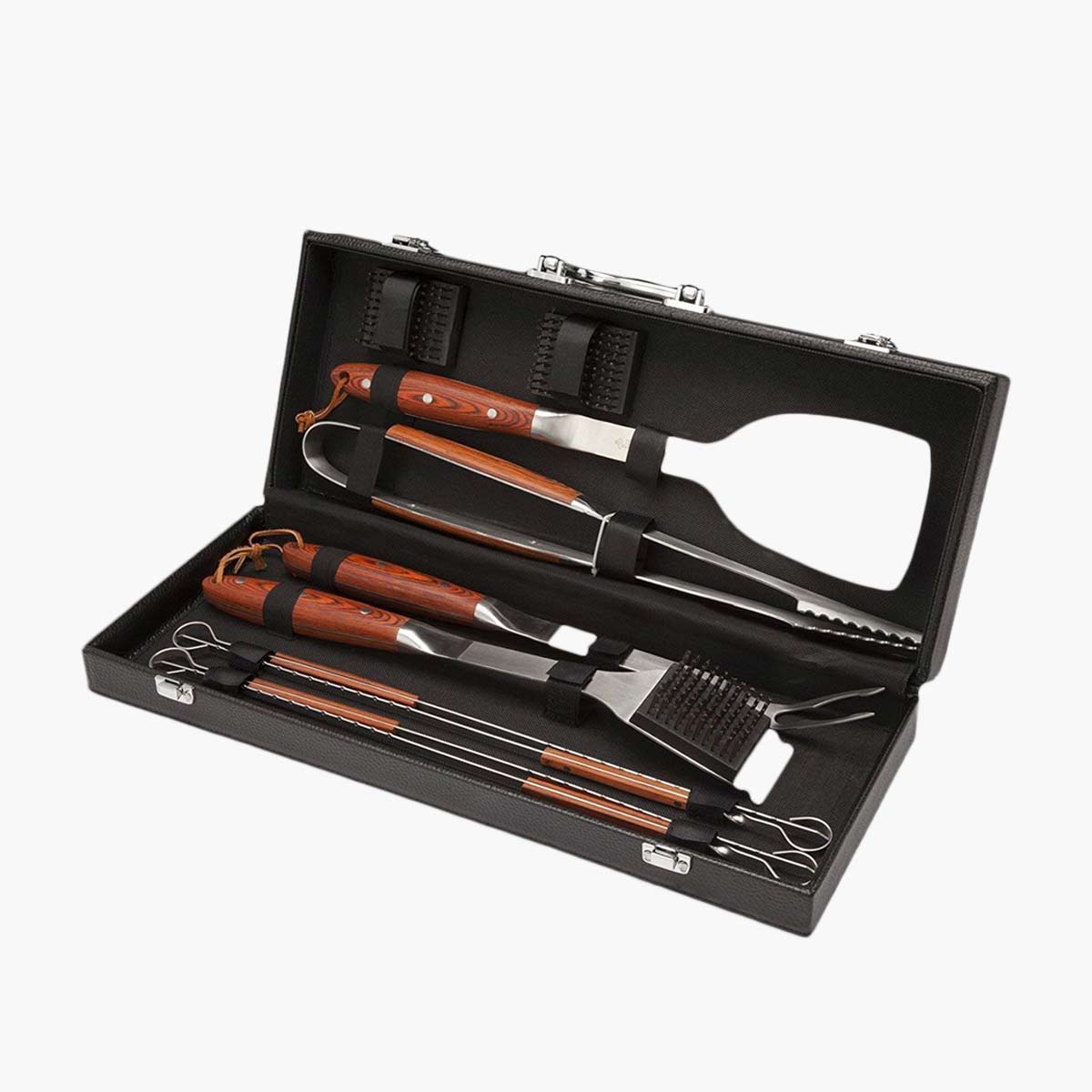 A grilling tool set with spatula, tongs, brush, and skewers.