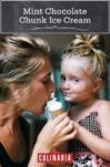 A mother and daughter sharing a mint chocolate chunk ice cream cone.