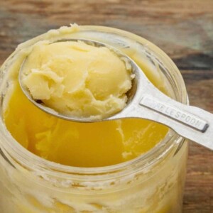 Scooping out a tablespoon of Duck Fat.