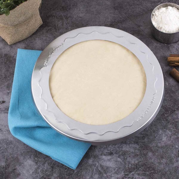 Pie Crust Protector Shield on Blue Napkin