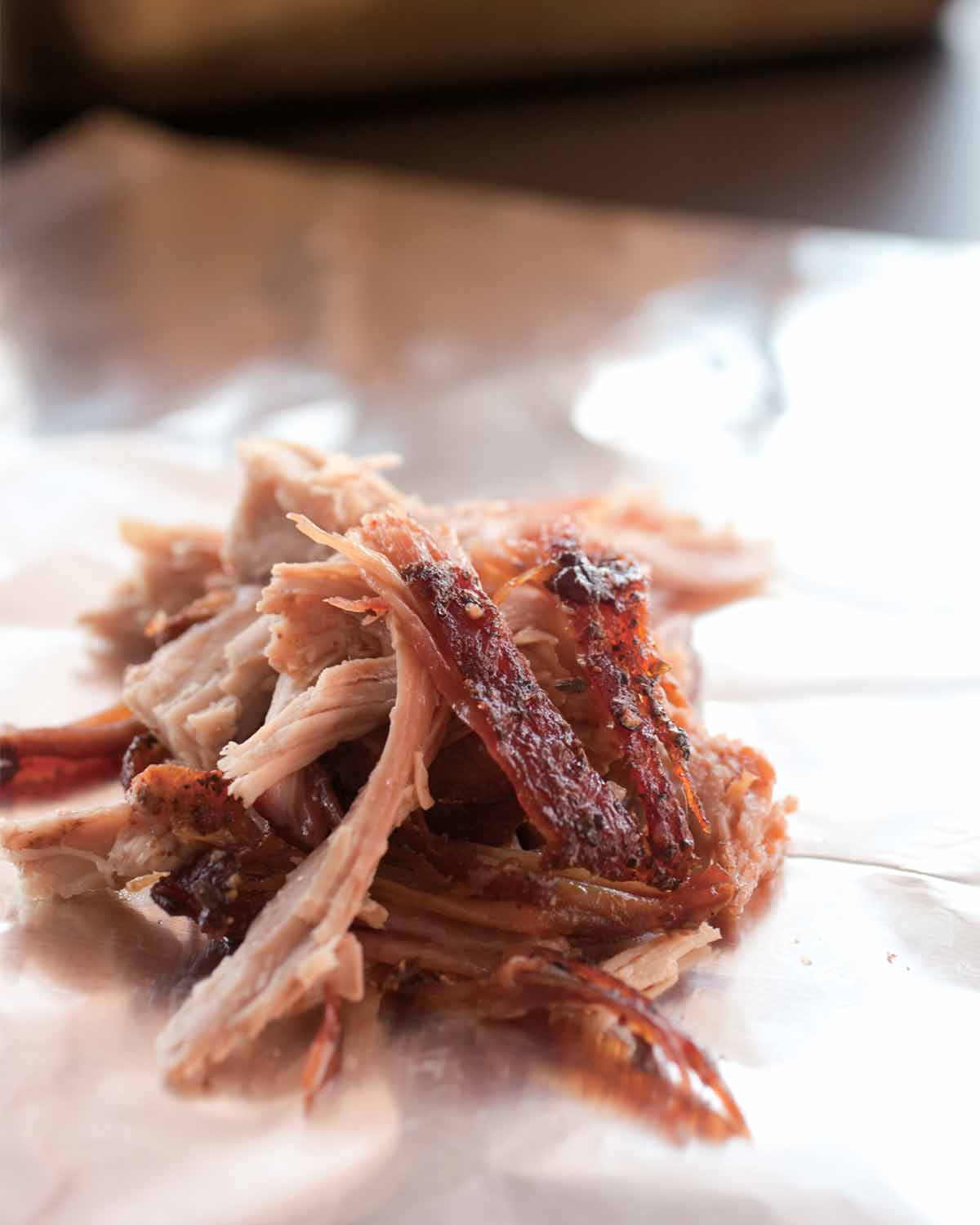 A small pile of shredded slow cooker pulled pork.