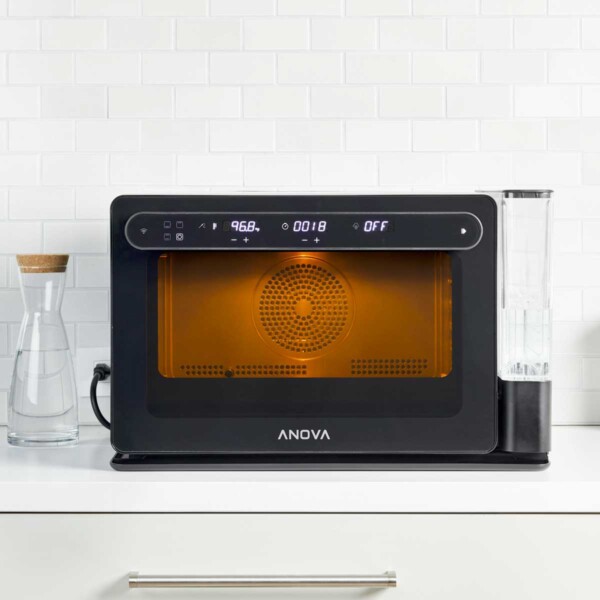 Anova Precision Oven on white counter.